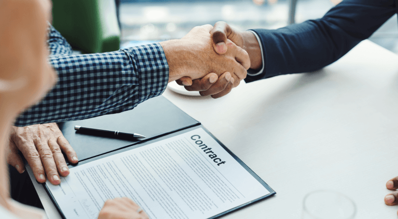 24f309e2 Two Men Shaking Hands 1